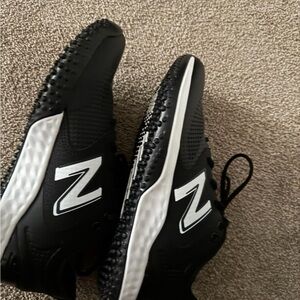 black and white new balance turf shoes size 9